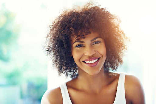light-skinned woman smiling